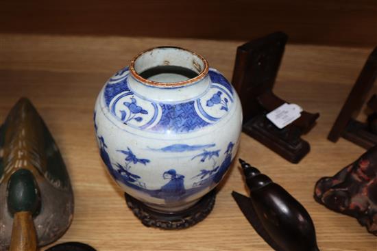 A Chinese Ming blue and white jar, Wanli period, hare mark, with hardwood stand and cover height excl. stand and cover 17cm